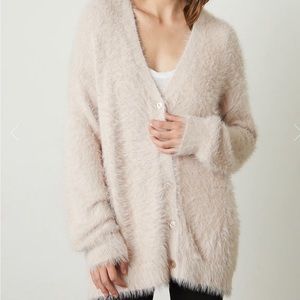 This won’t last when Fall rolls around! Beautiful, soft cardigan sweater.